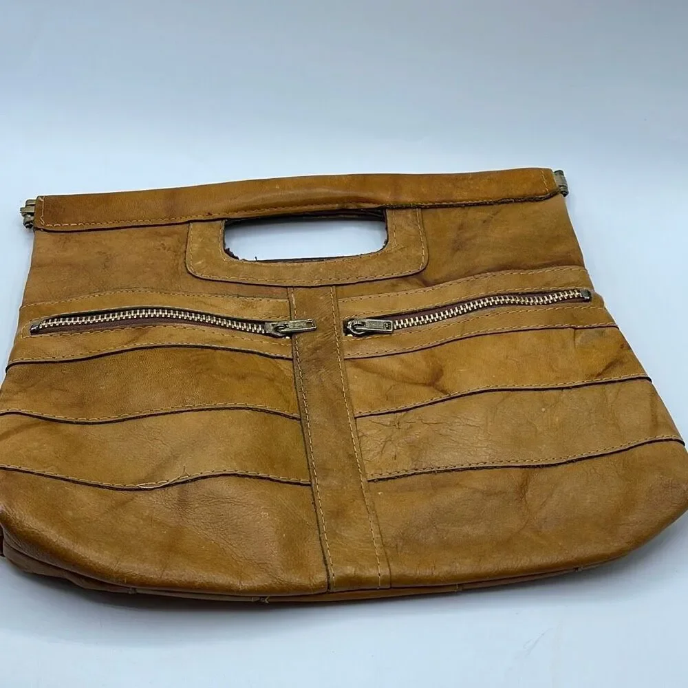 Vintage boho Leather Made in Hong Kong top handle bag.